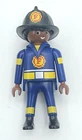 Playmobile Fire Fighter Figure In Blue Yellow Uniform W/a Red Shield Vg Used. Price: $6.99.