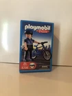 Playmobil - Police Man With Bike #5735 New. Price: $25.00.