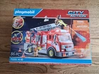 New Playmobil City Action Fire Truck Box With 2 Figures Included. Price: $27.96.