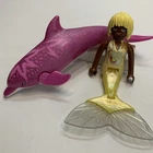 2 Playmobil Figures-mermaid Girl And Large Pink Dolphin Used. Price: $14.99.