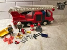 Playmobil 3182 -- Rescue Ladder Fire Truck Complete W/ Working Lights Used. Price: $50.00.