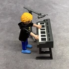 Playmobil 5604 City Life Keyboard & Microphone + Musician Figure Used. Price: $13.99.