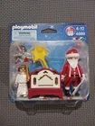 Playmobil 4889 Little Angel & Santa Claus With Organ Duo Pack New. Price: $34.99.