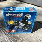 Playmobil Police 3332 Motorcycle Officer Geobra New In Damaged Box. Price: $12.60.
