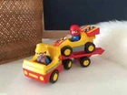 10 Playmobil 123 Figure Racing Car With Transport Truck Ref 6761 Occasion. Price: $17.49.