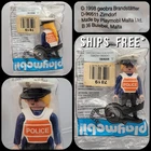 Vintage Playmobil Female Police Officer Keychain Figure 1998 #7819 - Sealed New. Price: $19.95.
