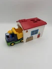 Playmobil 123 Set 70184- Construction Truck, Figurine With Garage. Missing Doors Used. Price: $17.00.