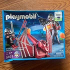 Playmobil Dragon Wing Knight Catapult Set 5832 New Factory Sealed Box. Price: $33.55.