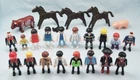 Playmobil, Geobra Lot Of 24 - 18 People, 3 Horses, Saddle, Cow And Pig Used. Price: $9.99.