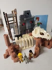 Playmobil 3040 & 9429. Hidden Temple Ruins + Jungle Skeleton Dinosaur Tribesmen Used. Price: $30.00.