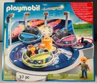 Playmobil 5554 Spinning Spaceship Ride W/ Light New Factory Sealed Box. Price: $105.00.