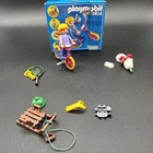 Playmobil 4999 Multikid Bicycle, Tennis, Flowers, Sledding Child Figure. Used. Price: $11.99.