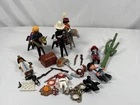 Playmobil Cowboy, Native American, Egyptian Figurines And Accessories Used. Price: $28.00.