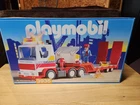 Vintage Nsib Playmobil 3935 Gigant Tractor Trailer W/ Flashing Lights! 2000 New. Price: $199.00.