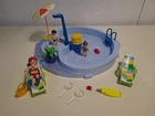 Playmobil #3205 Swimming Pool Set 2002 Incomplete Discontinued Box Used. Price: $17.95.