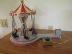 Playmobil 5548 Flying Swings Carnival Carousel Figures Lights Spinning Toy Used. Price: $40.00.