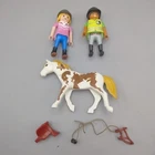 Playmobil Country #9258 Riding Instructor Set With White/brown Horse Used. Price: $15.00.