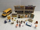 Playmobil Lot: Take Along Modern Doll House, School Bus, Figures, Accessories Used. Price: $40.00.