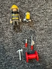 Playmobil Firefighter Set 3882 Vintage Figure With Accessories Used. Price: $8.50.